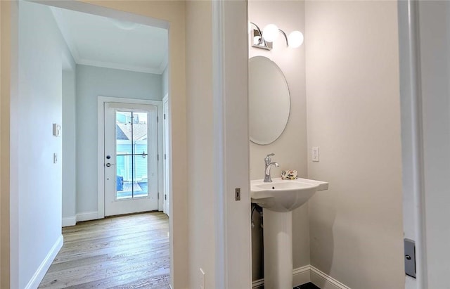 20 Kettle Point Ave, East Providence, RI 02914 - bathroom with wood finished floors and ornamental molding