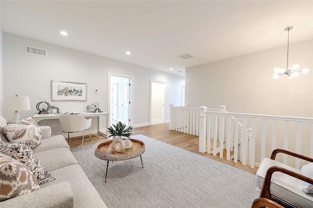 20 Kettle Point Ave, East Providence, RI 02914 - living area with a chandelier, recessed lighting, and light wood-style flooring