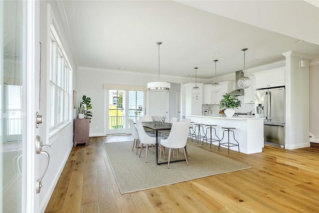 20 Kettle Point Ave, East Providence, RI 02914 - dining room featuring light wood-style floors and crown molding