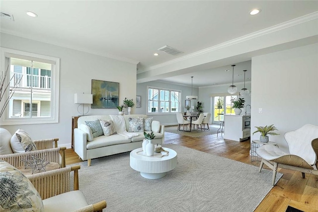 20 Kettle Point Ave, East Providence, RI 02914 - living area with wood finished floors, crown molding, and recessed lighting