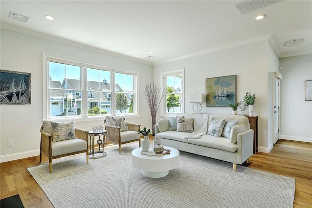 20 Kettle Point Ave, East Providence, RI 02914 - living room featuring wood finished floors, crown molding, and recessed lighting