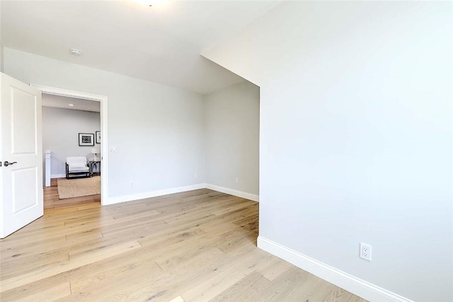 20 Kettle Point Ave, East Providence, RI 02914 - spare room with light wood finished floors and a smoke detector