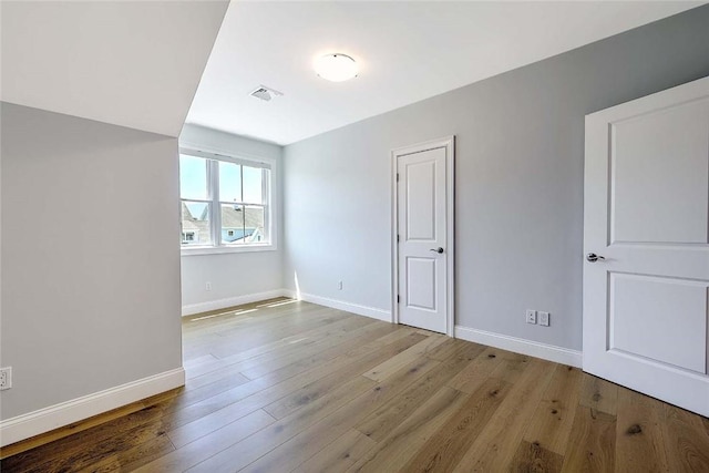20 Kettle Point Ave, East Providence, RI 02914 - unfurnished bedroom featuring wood finished floors