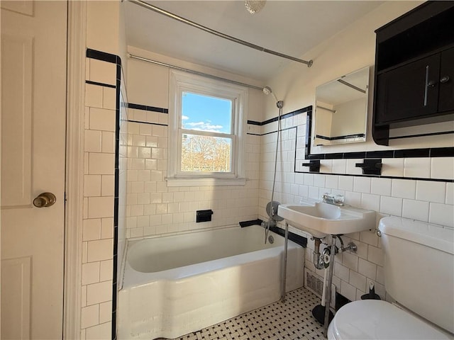 23 Preston Dr, North Kingstown, RI 02852 - full bathroom featuring shower / tub combination, tile walls, and backsplash