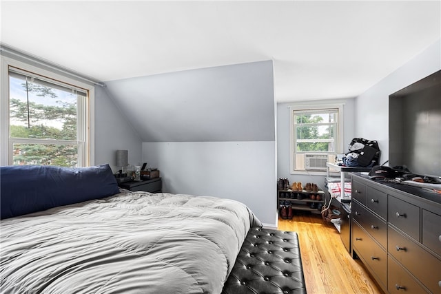 23 Preston Dr, North Kingstown, RI 02852 - bedroom with light wood-type flooring, cooling unit, and vaulted ceiling
