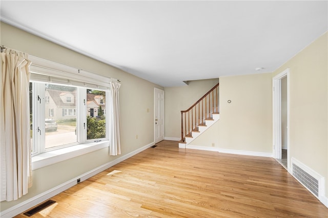 15 Preston Dr, North Kingstown, RI 02852 - foyer entrance with light wood finished floors and stairway