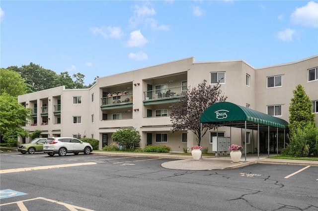 31 Devereux Ave Unit 115, Providence, RI 02909 - view of apartment building / complex with uncovered parking