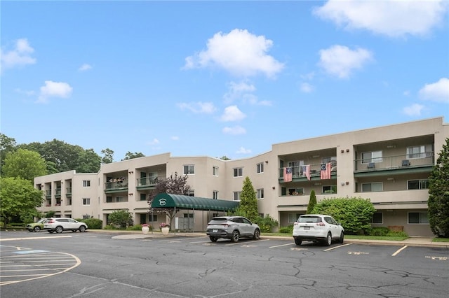 31 Devereux Ave Unit 115, Providence, RI 02909 - view of apartment building / complex with uncovered parking
