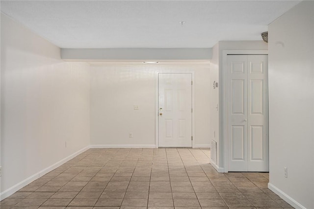 31 Devereux Ave Unit 115, Providence, RI 02909 - empty room featuring light tile patterned flooring and baseboards