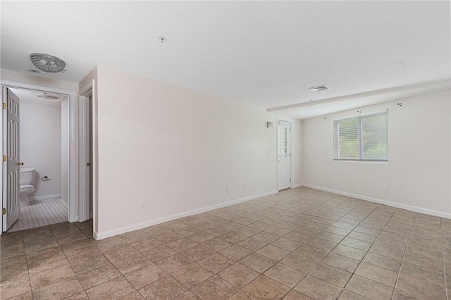 31 Devereux Ave Unit 115, Providence, RI 02909 - unfurnished room featuring light tile patterned floors and baseboards