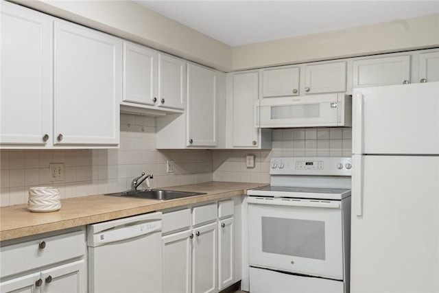 31 Devereux Ave Unit 115, Providence, RI 02909 - kitchen with white appliances, white cabinetry, and tasteful backsplash