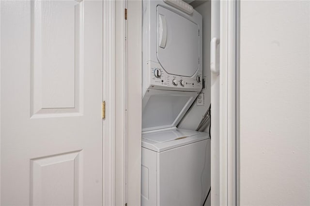 31 Devereux Ave Unit 115, Providence, RI 02909 - laundry area with stacked washing machine and dryer