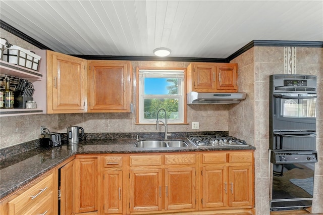 82 Martin St, East Providence, RI 02914 - kitchen featuring black oven, stainless steel gas cooktop, under cabinet range hood, ornamental molding, and a warming drawer