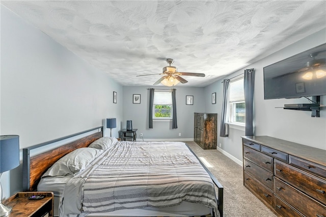 82 Martin St, East Providence, RI 02914 - bedroom with light colored carpet and a ceiling fan