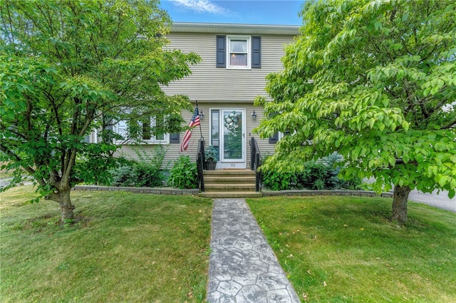 82 Martin St, East Providence, RI 02914 - colonial house featuring a front yard