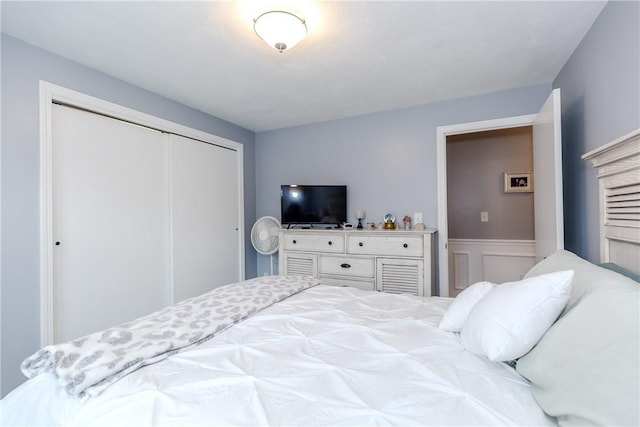 10 Pembroke Dr, Johnston, RI 02919 - bedroom with a closet, a wainscoted wall, and a decorative wall
