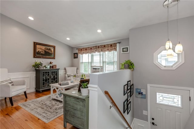 10 Pembroke Dr, Johnston, RI 02919 - entryway featuring light wood-type flooring, a wainscoted wall, recessed lighting, and lofted ceiling