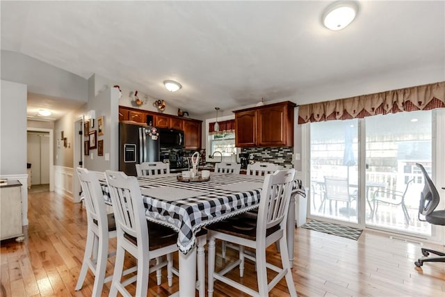 10 Pembroke Dr, Johnston, RI 02919 - dining room with light wood finished floors and wainscoting
