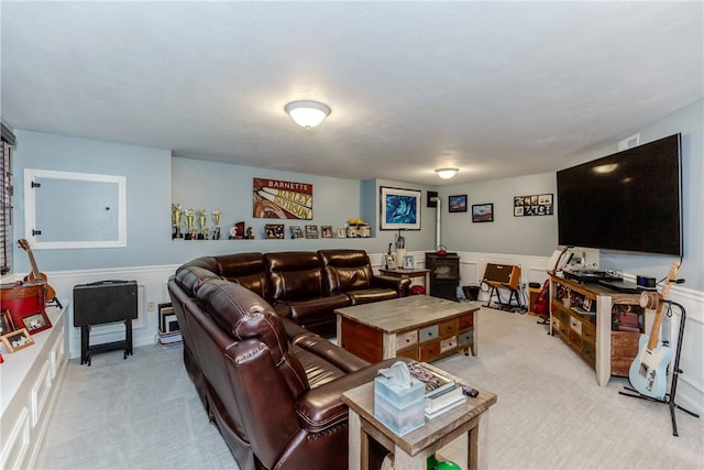 10 Pembroke Dr, Johnston, RI 02919 - living area with light colored carpet, a wainscoted wall, and a decorative wall