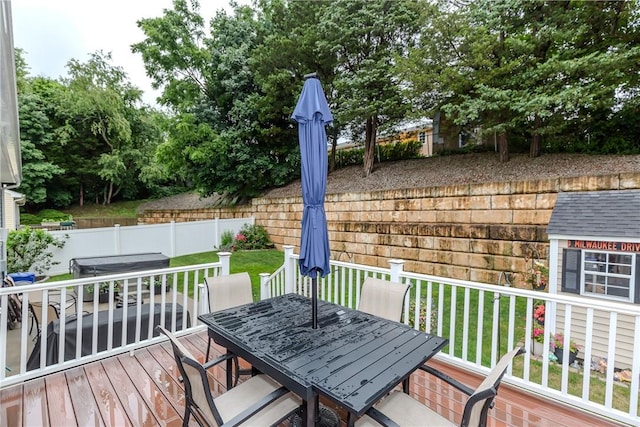 10 Pembroke Dr, Johnston, RI 02919 - deck with outdoor dining space and a fenced backyard