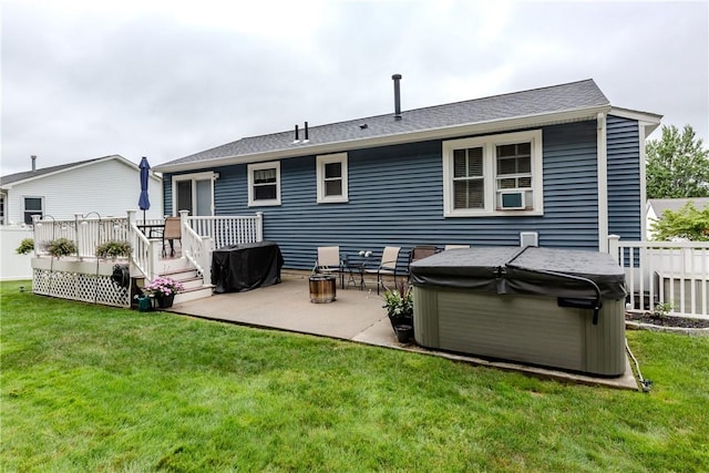 10 Pembroke Dr, Johnston, RI 02919 - rear view of house featuring a hot tub, a deck, a patio, and roof with shingles