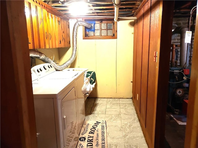 603 Wakefield St, West Warwick, RI 02893 - laundry area with washing machine and dryer and cabinet space