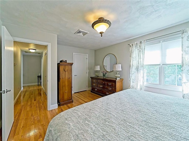 15 Lilac Cir, Cranston, RI 02920 - bedroom with light wood finished floors and baseboards