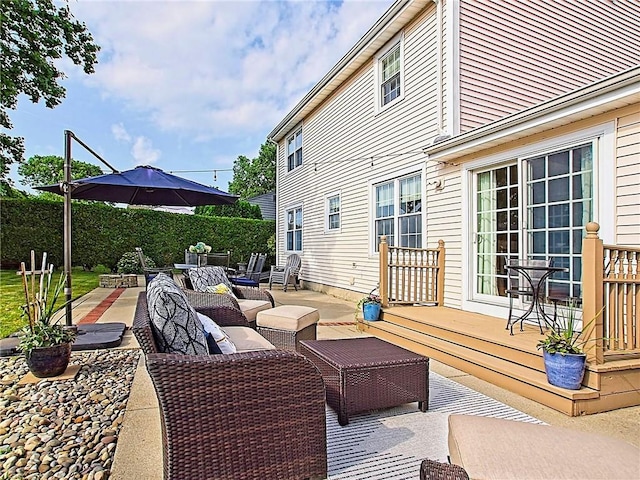 15 Lilac Cir, Cranston, RI 02920 - wooden deck featuring an outdoor hangout area, outdoor dining space, and a patio