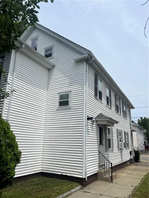 38 Moorefield St, Providence, RI 02909 - view of property exterior featuring entry steps and cooling unit