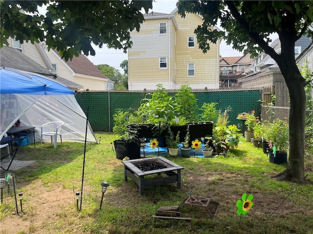 38 Moorefield St, Providence, RI 02909 - fenced backyard with a garden