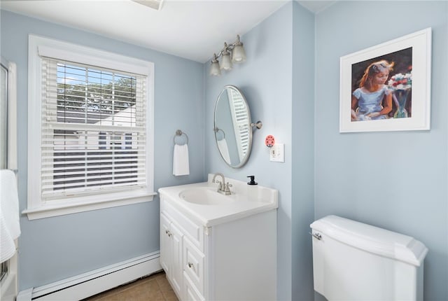 221 Trinity St, Warwick, RI 02886 - bathroom with a baseboard heating unit, vanity, and tile patterned floors