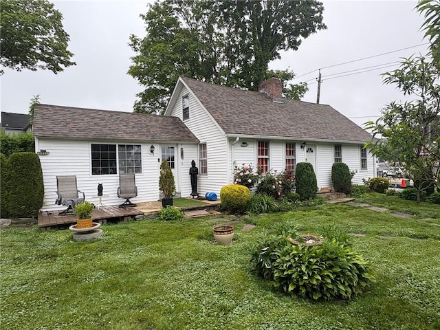 264 W Main St, North Kingstown, RI 02852 - cape cod-style house with a chimney, a front lawn, a deck, and a shingled roof