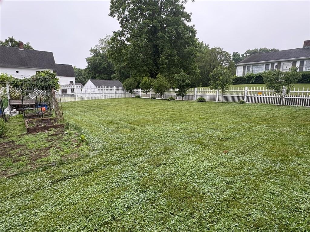 264 W Main St, North Kingstown, RI 02852 - view of yard with a garden