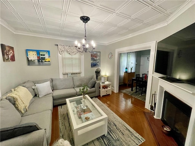 113 Alger Ave, Providence, RI 02905 - living area featuring a chandelier, an ornate ceiling, dark wood finished floors, and healthy amount of natural light