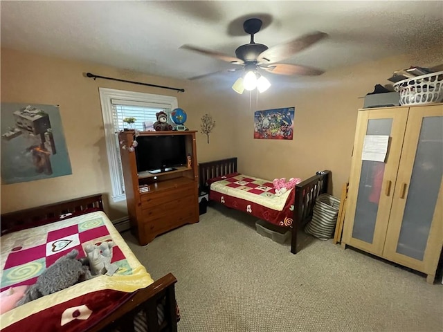 113 Alger Ave, Providence, RI 02905 - bedroom featuring carpet flooring, a ceiling fan, and a baseboard heating unit