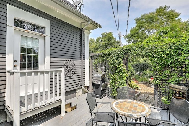 53 Avon St, Somerset, MA 02726 - wooden terrace featuring outdoor dining area and grilling area