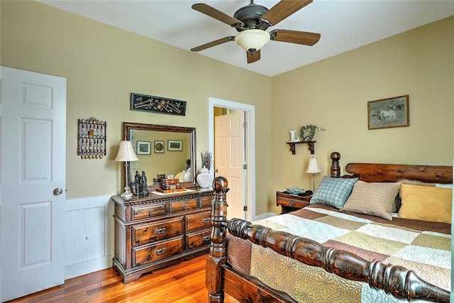 53 Avon St, Somerset, MA 02726 - bedroom with wood finished floors, wainscoting, and ceiling fan