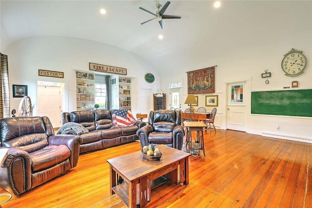 53 Avon St, Somerset, MA 02726 - living room with lofted ceiling, light wood-style flooring, ceiling fan, a baseboard radiator, and recessed lighting