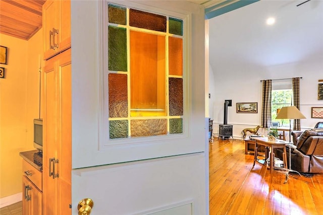 53 Avon St, Somerset, MA 02726 - detailed view of a wood stove and wood finished floors