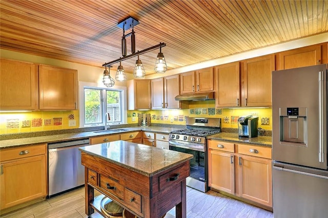 53 Avon St, Somerset, MA 02726 - kitchen with appliances with stainless steel finishes, under cabinet range hood, wooden ceiling, dark stone counters, and decorative light fixtures