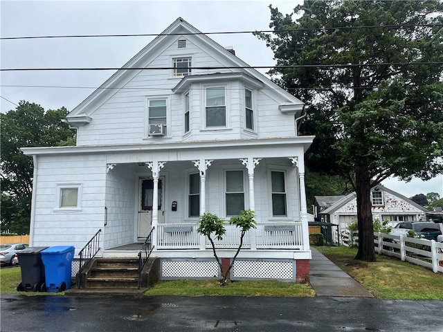 12 Winthrop St, Cranston, RI 02910 - view of front of property featuring a porch and cooling unit