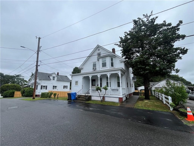 12 Winthrop St, Cranston, RI 02910 - view of front of property with a porch