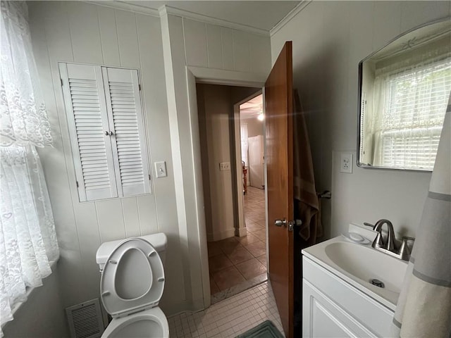 12 Winthrop St, Cranston, RI 02910 - bathroom with vanity, tile patterned floors, and crown molding