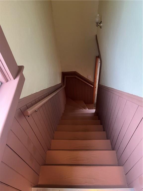 12 Winthrop St, Cranston, RI 02910 - stairs featuring a wainscoted wall