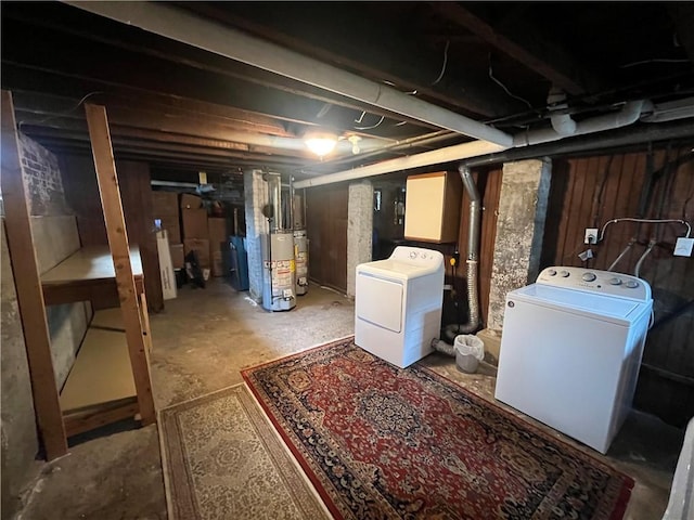 12 Winthrop St, Cranston, RI 02910 - unfinished basement with water heater, strapped water heater, and independent washer and dryer