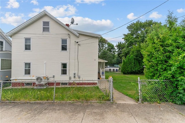 10 Foundry St, Central Falls, RI 02863 - view of home's exterior with a fenced front yard