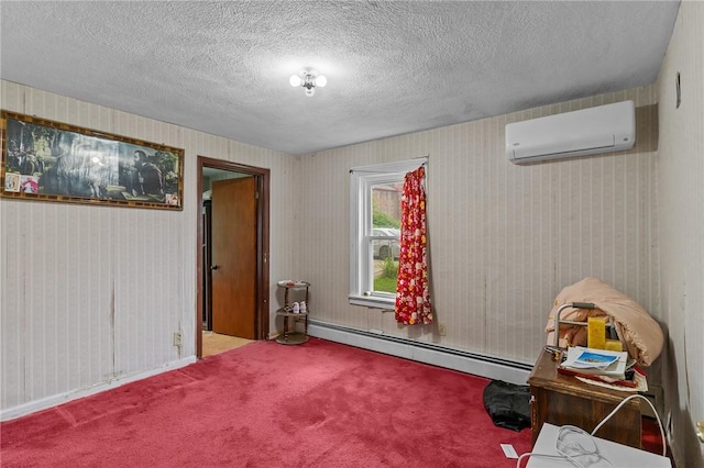 10 Foundry St, Central Falls, RI 02863 - bedroom with baseboard heating, an AC wall unit, carpet flooring, and a textured ceiling