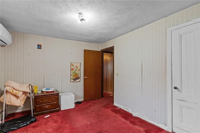 10 Foundry St, Central Falls, RI 02863 - bedroom with a textured ceiling, carpet flooring, and a wall mounted air conditioner