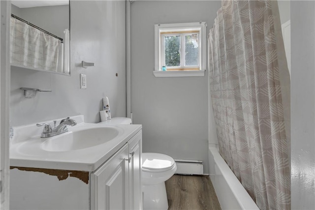 1 Ware St, Providence, RI 02907 - bathroom featuring baseboard heating, wood finished floors, vanity, and shower / bath combo