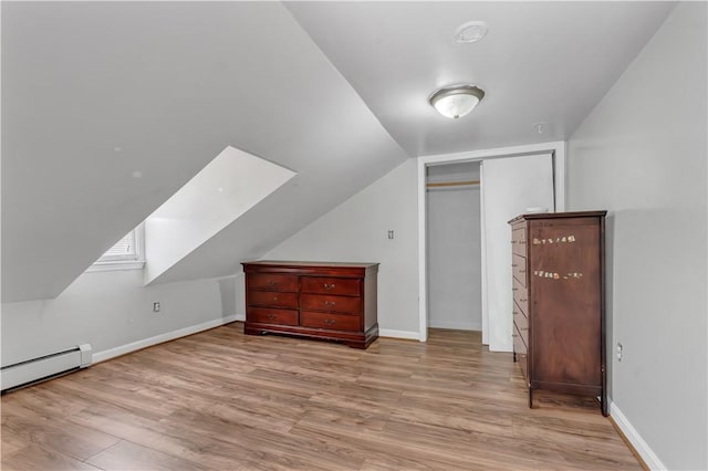1 Ware St, Providence, RI 02907 - additional living space featuring wood finished floors, lofted ceiling, and baseboard heating